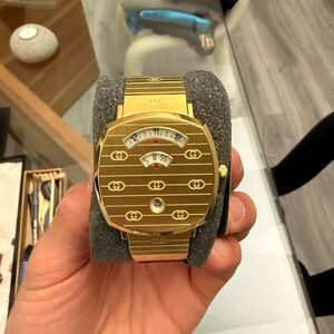 Sold! Gucci grip watch 38MM yellow gold PVD stainless steel interlocking G watch